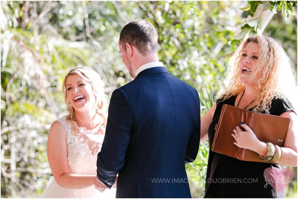 Liz & Jarrod - Bride and groom laughing along with Lynette Maguire Marriage Celebrant