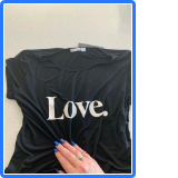 Love tee - it's what I do - Black tshirt with LOVE in big white letters and a female hand with blue nails touching it
